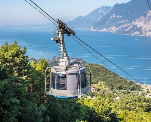 The Cable Car Monte Baldo offers breathtaking views of Lake Garda and the surrounding mountains, ascending to a height of 1,800 meters.